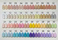 Forty handmade press-on nails in assorted solid colors, arranged in rows and numbered 01-40.