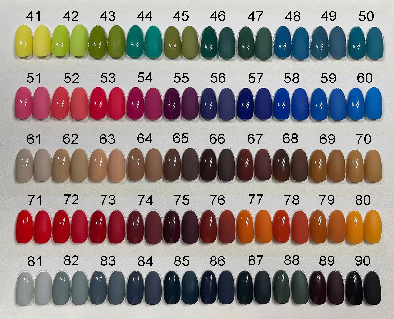 Assorted press-on nail color swatches numbered 41 to 90 in various shades and finishes.