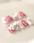 Handmade pink and white 3D rose coffin press-on nails with bow and pearl accents
