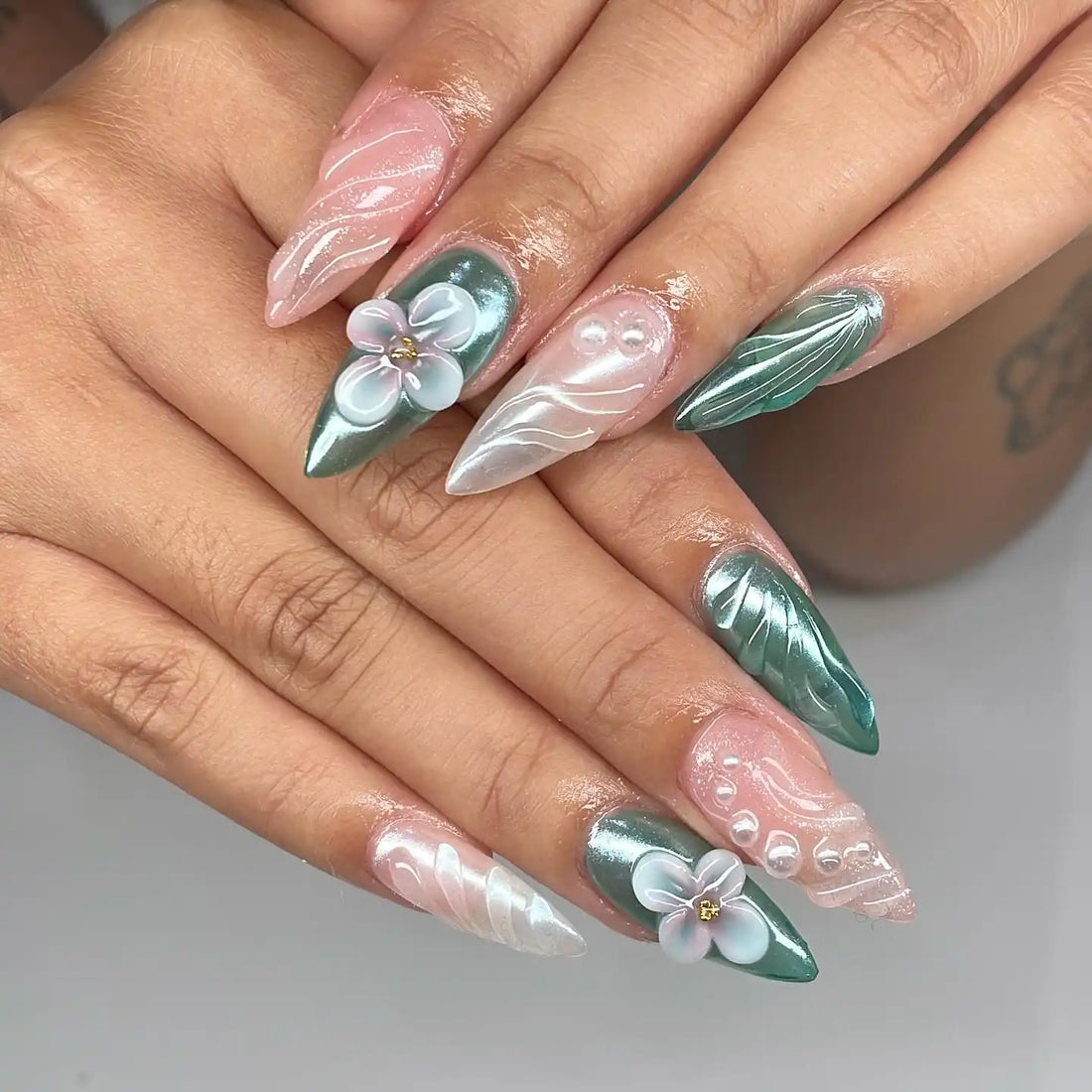 Handmade press-on nails with chrome green, pink, 3D flower, pearl and leaf designs