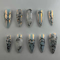 Handmade chrome silver 3D heart abstract metallic press-on nails with futuristic designs