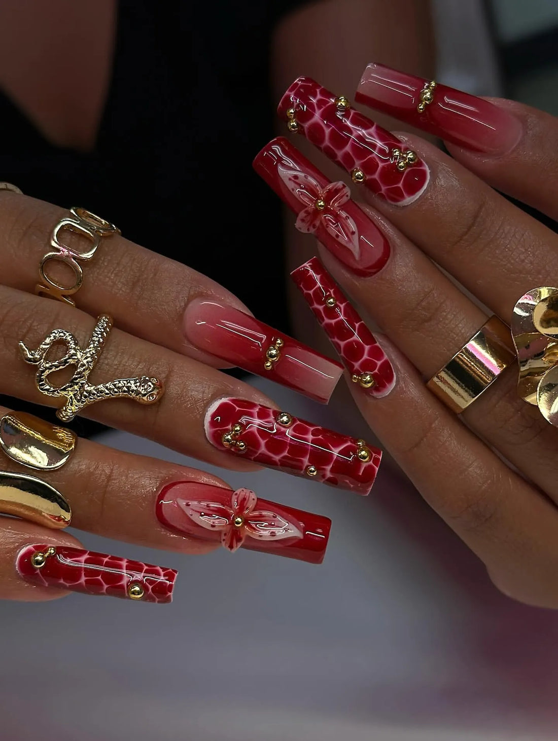 Handmade crimson red ombre crocodile print press-on nails with 3D flower and gold accents