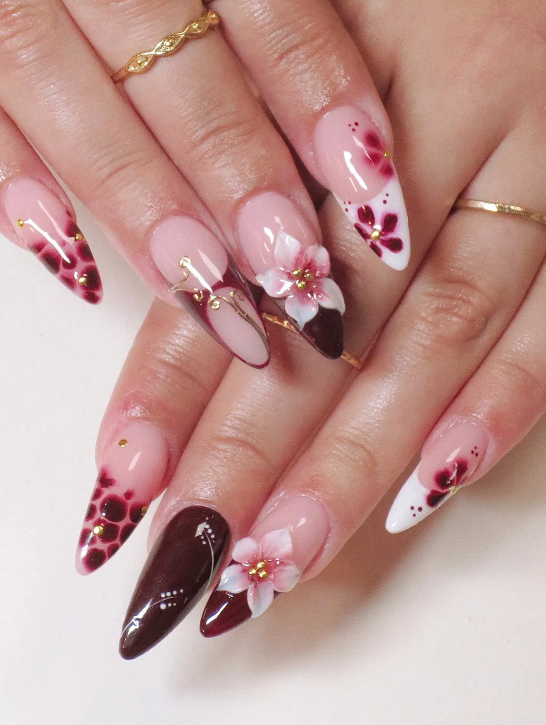 Handmade burgundy red press-on nails with 3D floral and leopard print design