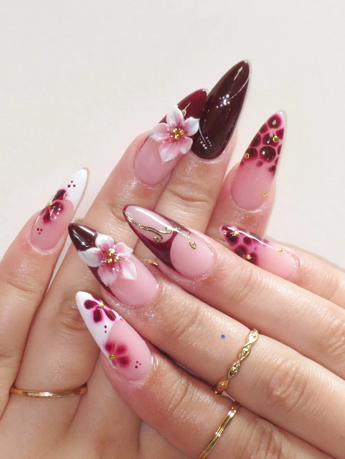 Handmade burgundy red press-on nails with 3D floral and leopard print design