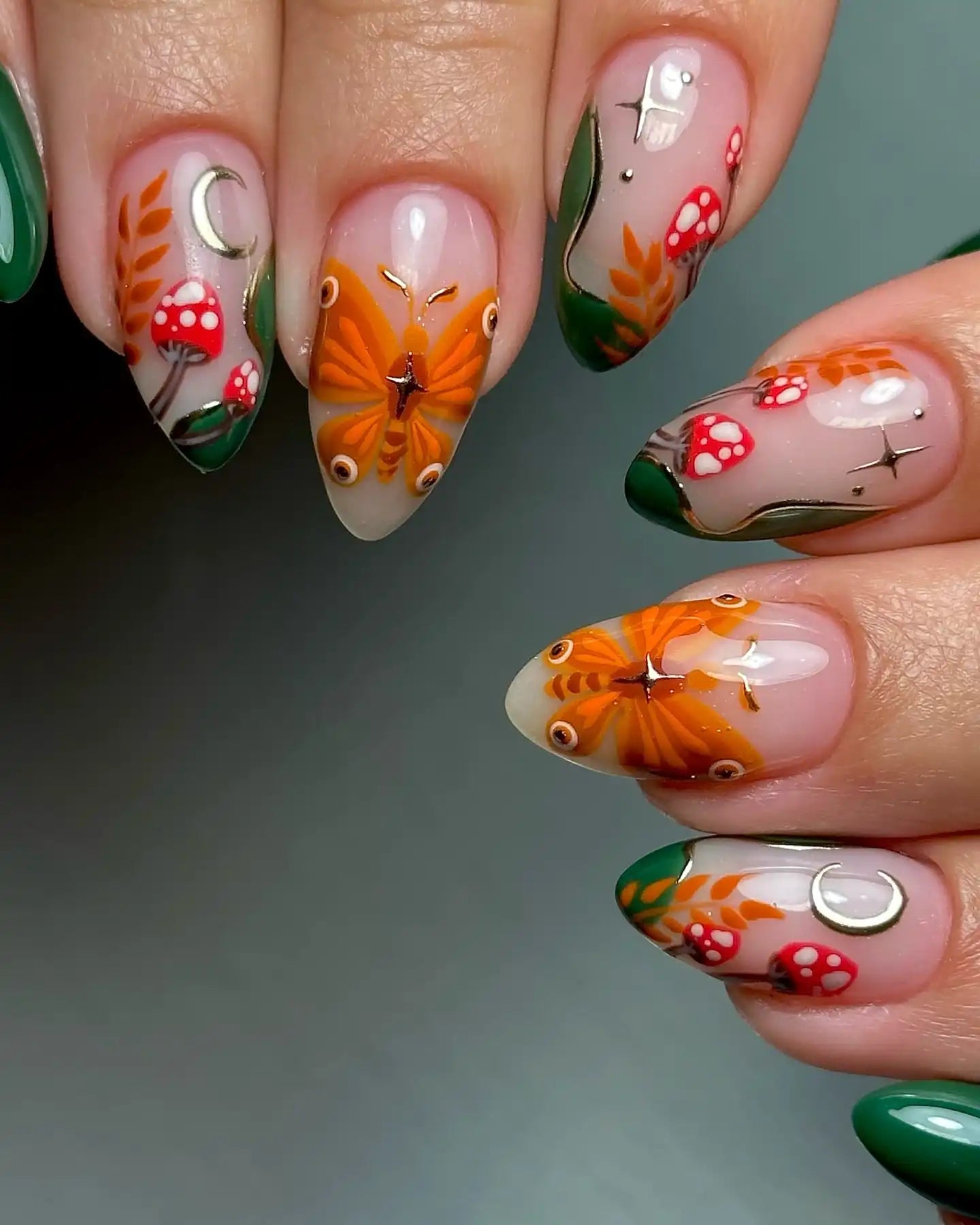 Handmade press-on nails with autumn butterfly, mushroom, moon, and fairycore designs.