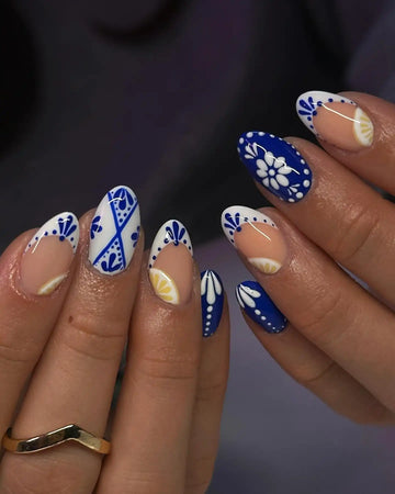 Handmade blue porcelain floral and lemon press-on nails with glossy finish