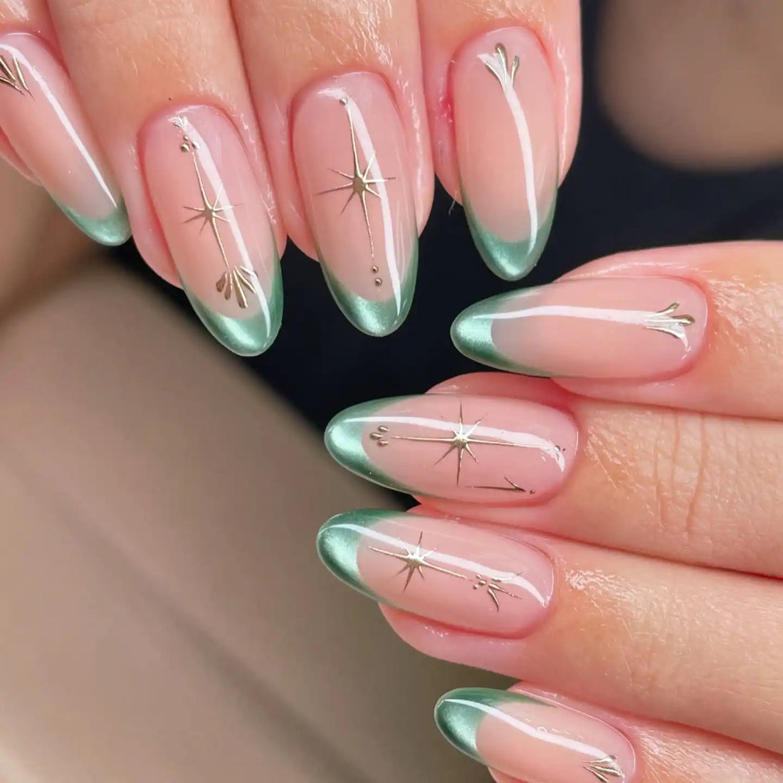 Handmade green French style press-on nails with gold star accents