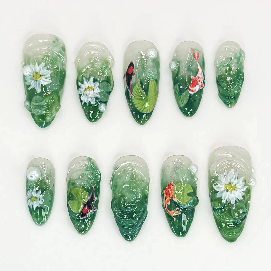 Handmade 3D green press-on nails with koi fish, lotus flowers, and pearl accents