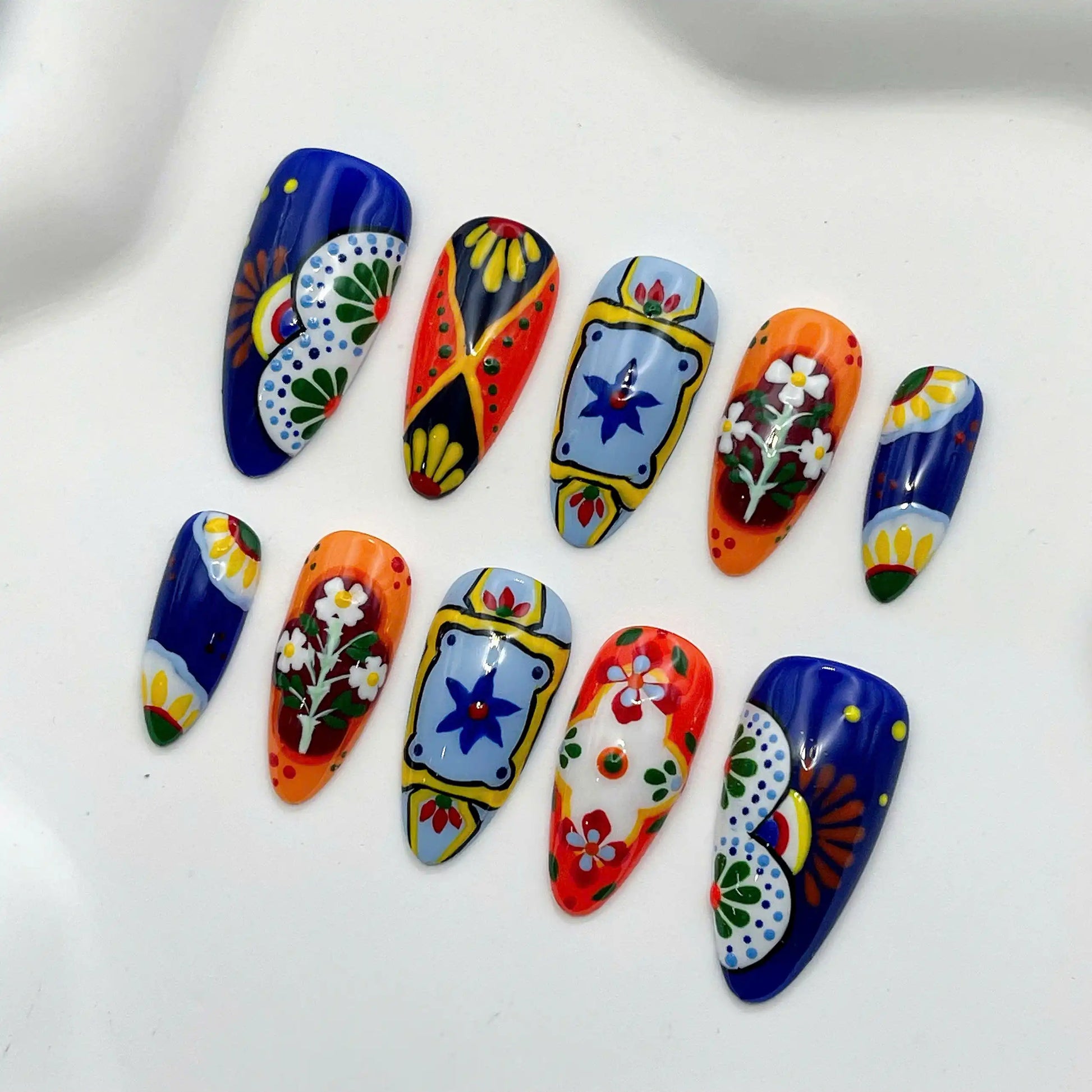 Handmade colorful press-on nails with Mexican Talavera tile art floral designs
