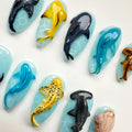 Handmade press-on nails with 3D ocean animals including sharks, dolphins, and whales.
