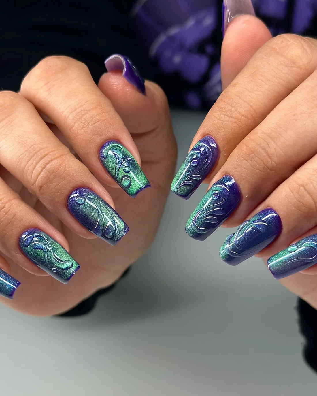 Handmade peacock green and purple 3D jelly swirl press-on nails with glossy finish