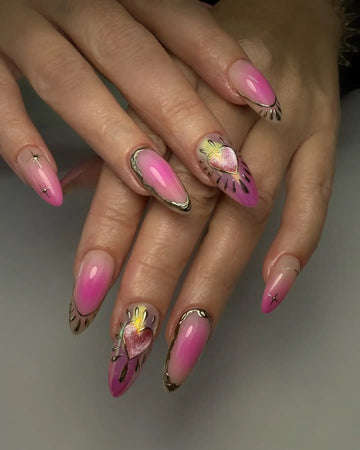 Handmade pink aura press-on nails with 3D heart accents and rose gold chrome details