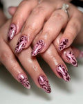 Handmade pink metallic chrome folk art heart press-on nails with intricate designs