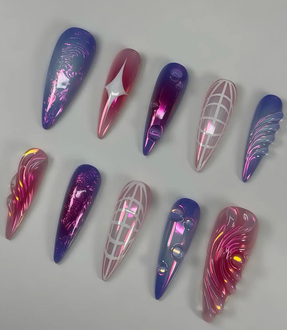 Handmade press-on nails with pink, purple chrome, abstract star, and glow accents