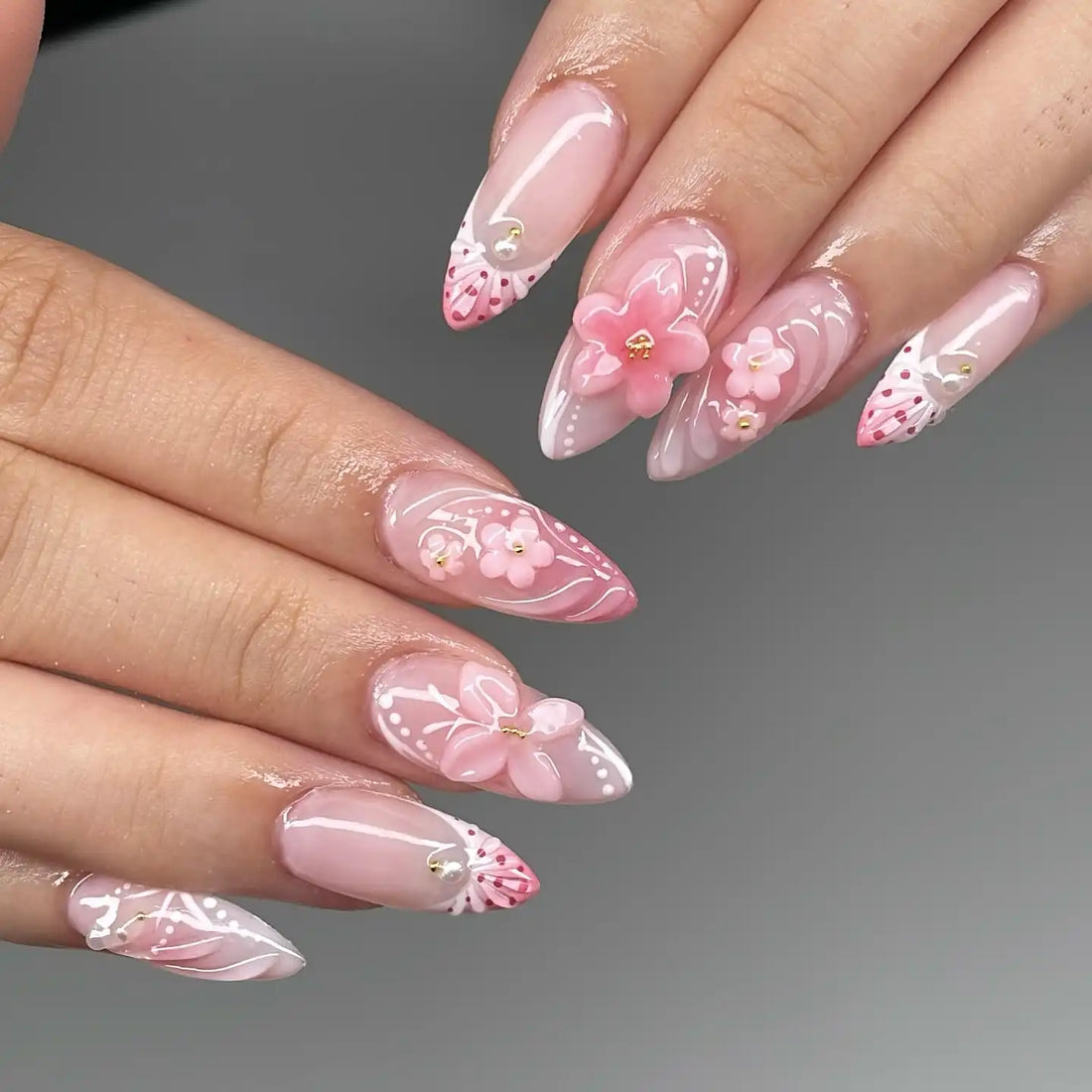 Handmade pink sakura 3D flower press-on nails with elegant spring French design