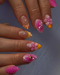 Handmade press-on nails with pink 3D flowers, pearls, shell and summer beach designs.