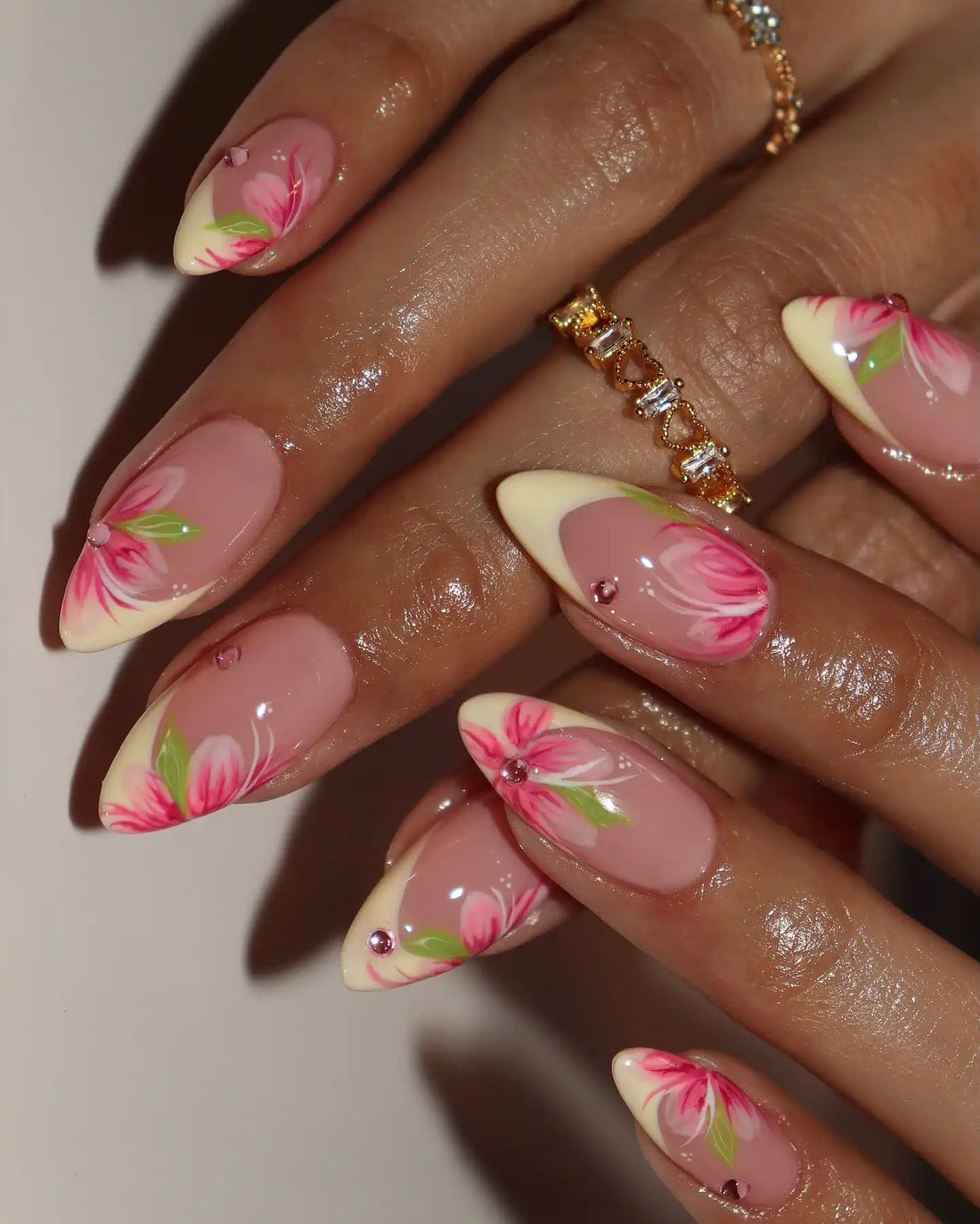 Handmade acrylic press-on nails with pink tulip flower French manicure design, spring style.