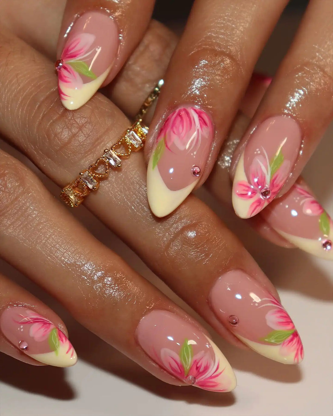 Handmade acrylic press-on nails with pink tulip flower French manicure design, spring style.