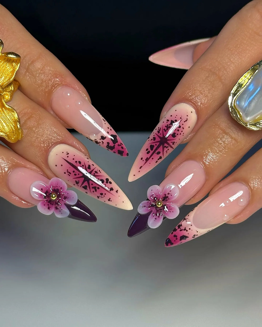 Handmade purple floral galaxy press-on nails with 3D flowers and star design