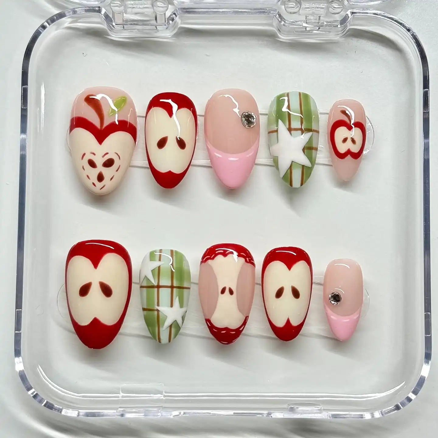 Handmade press-on nails set with cute red apple and green plaid fruit designs
