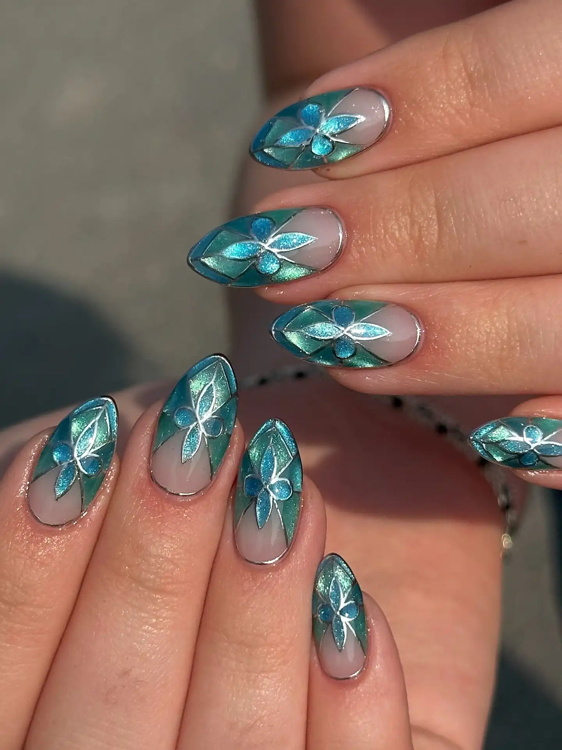 Handmade blue and silver floral stained glass press-on nails, elegant almond shape