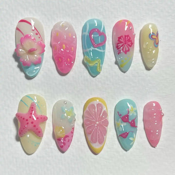 Handmade tropical press-on nails with 3D starfish, flowers, hearts, bikini, and summer floral designs.