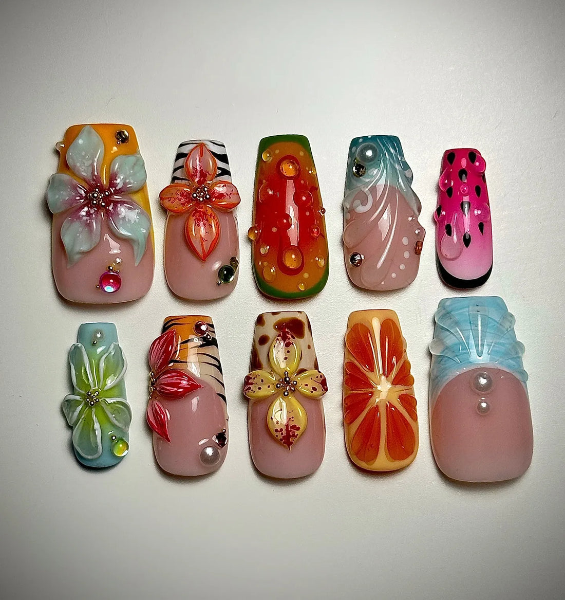 Handmade vibrant press-on nails with 3D tropical fruit and floral summer designs