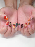 Handmade press-on nails with tropical hibiscus and autumn floral designs in multicolor.